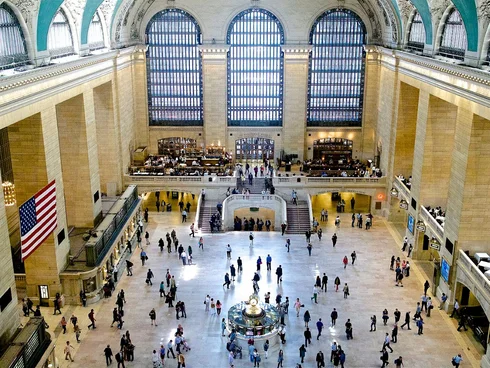 Station concourse with many people photographed from above