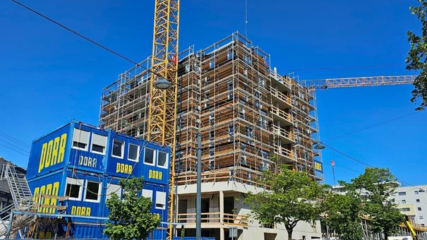 Construction site with containers in the foreground