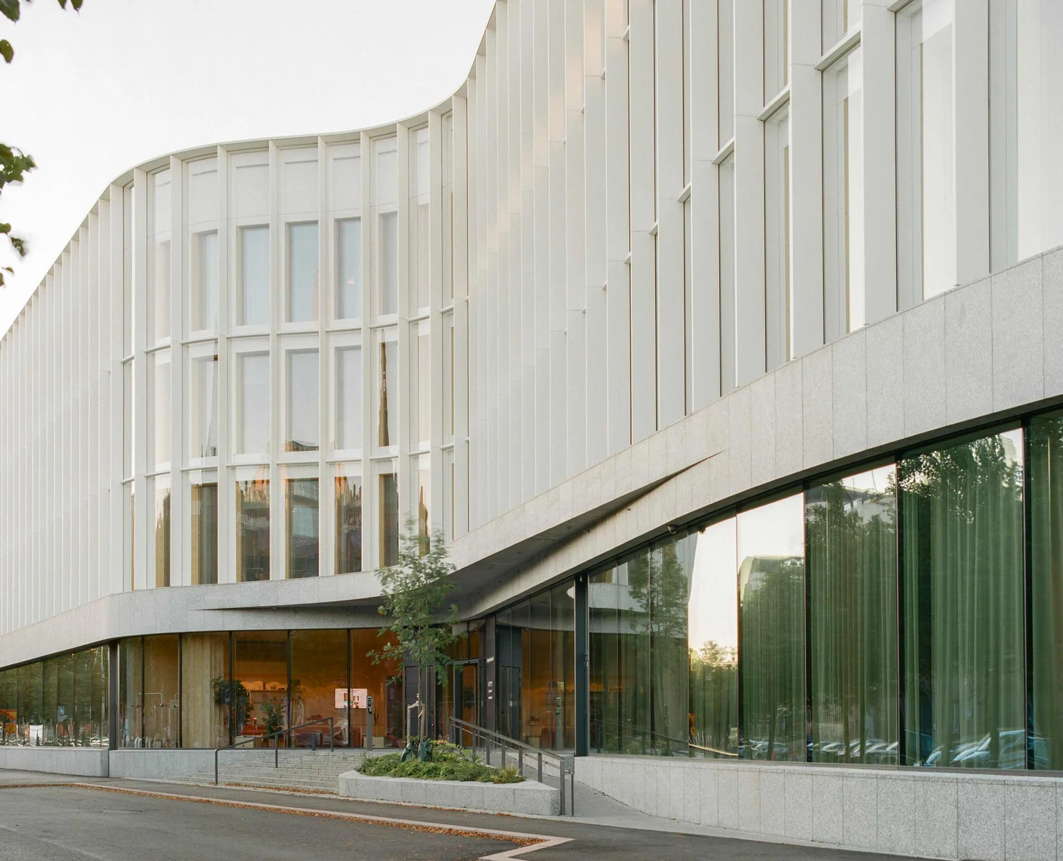 Office block with a white, curved façade